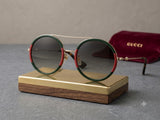 Gucci GG0061S-003 women Aviator sunglasses in gold color metal round