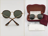 Gucci GG0061S-003 women Aviator sunglasses in gold color metal round