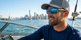 Costa Del Mar Reefton Pro sunglasses matte gray frame blue mirror 580G glass lens